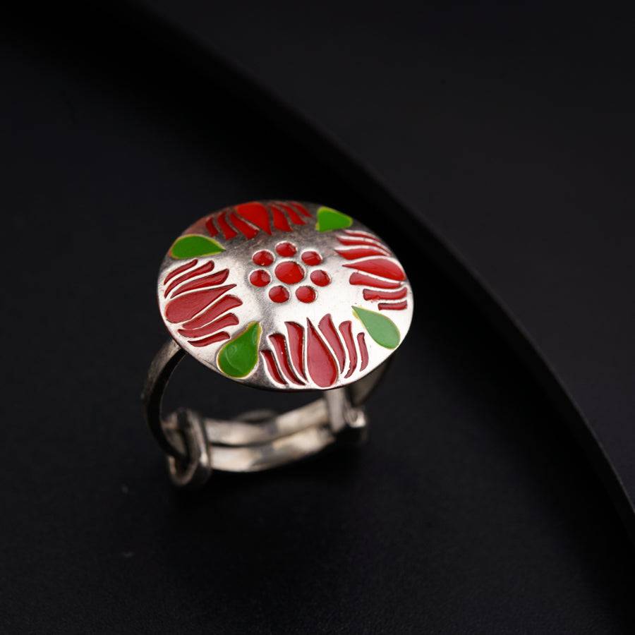 a close up of a ring on a black surface