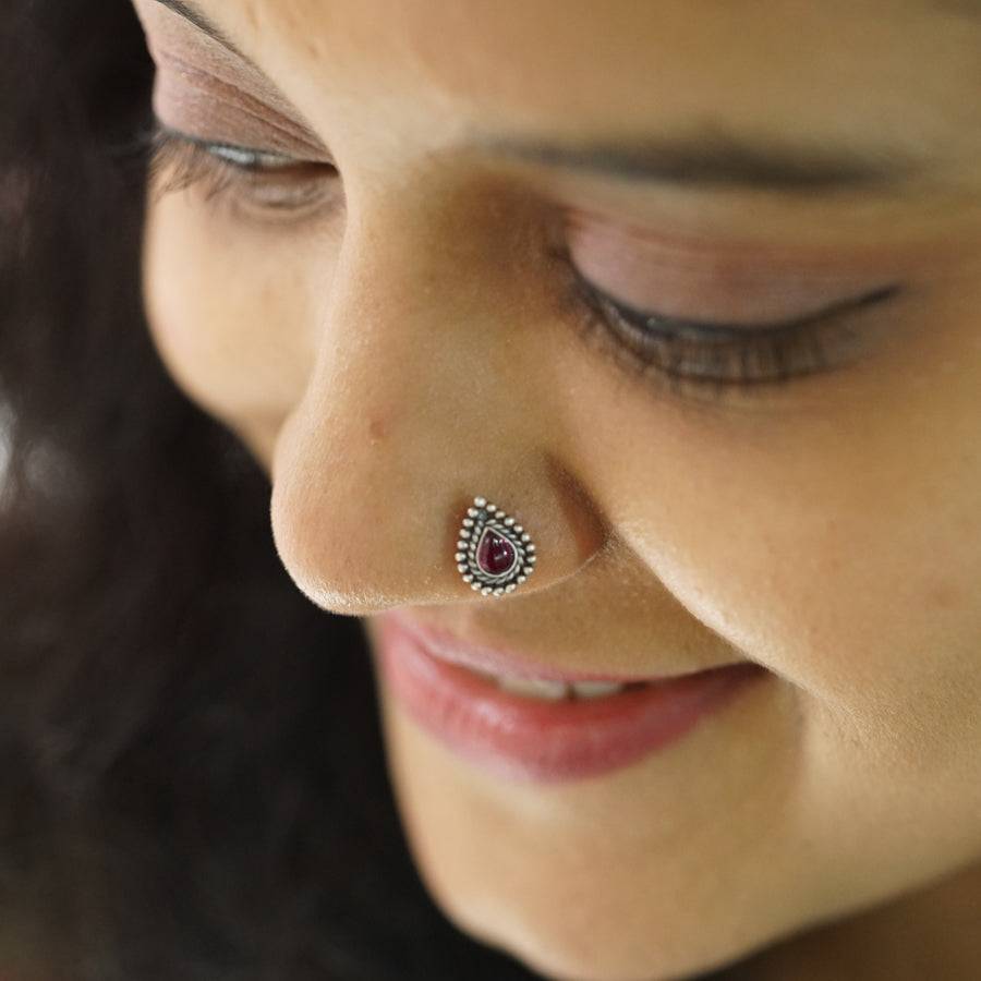 style silver nose pin pink stone with traditional outfit