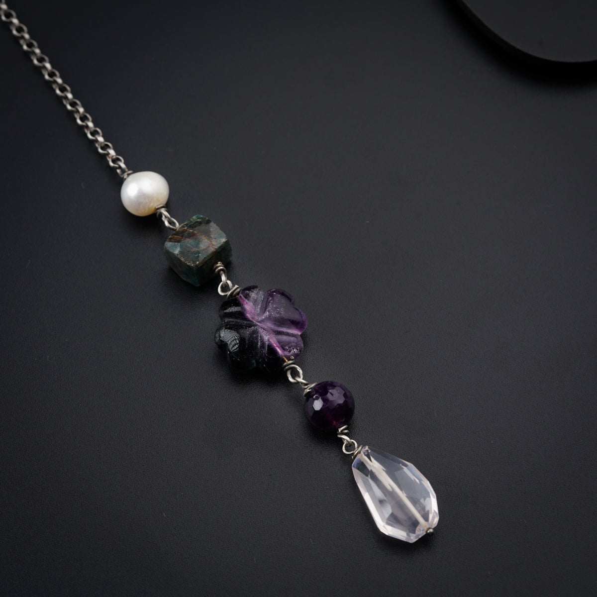 a necklace with a bunch of beads on it