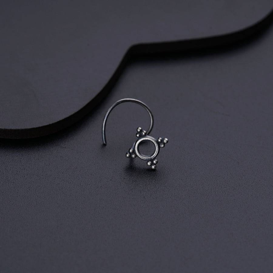 Tiny silver nose pin design