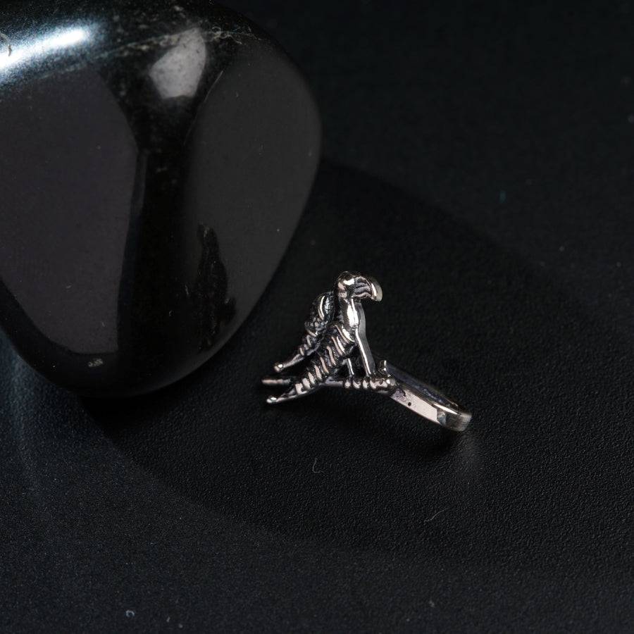 a pair of scissors sitting on top of a black table