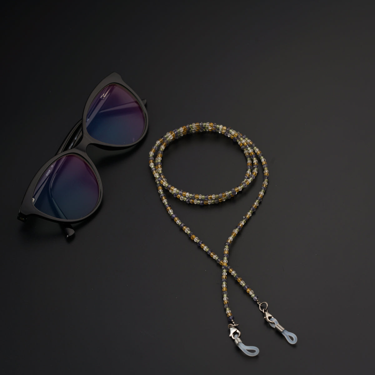 a lanyard with sunglasses and a pair of sunglasses