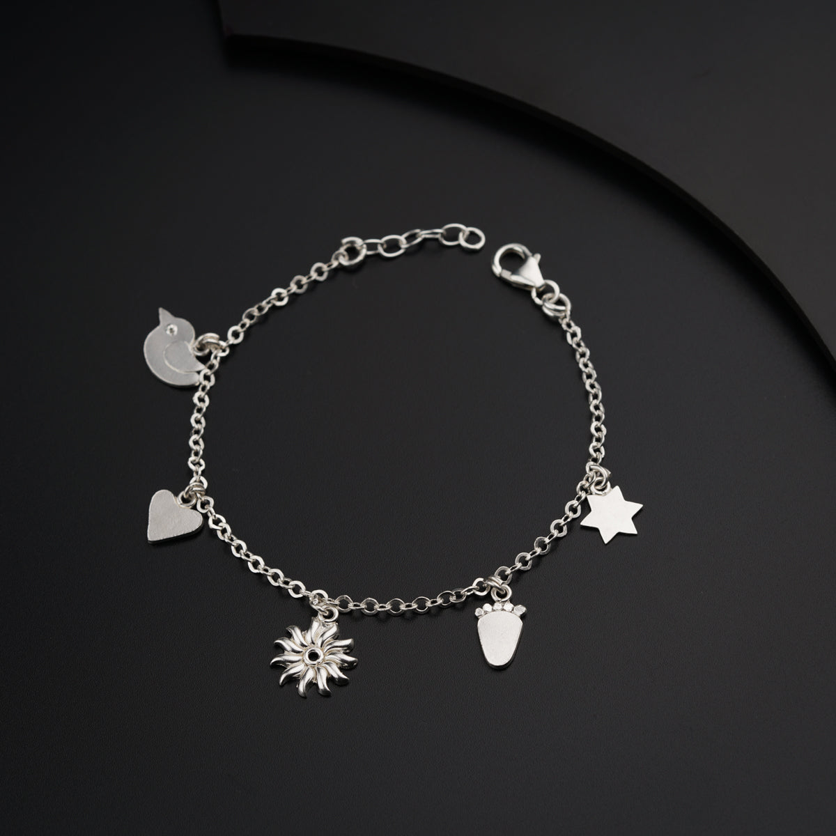 a close up of a bracelet on a table