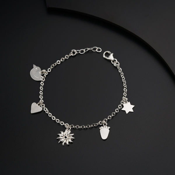 a close up of a bracelet on a table