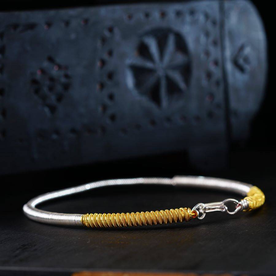 a close up of a bracelet on a table