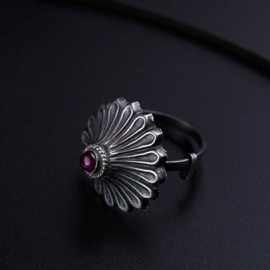 a close up of a ring on a table