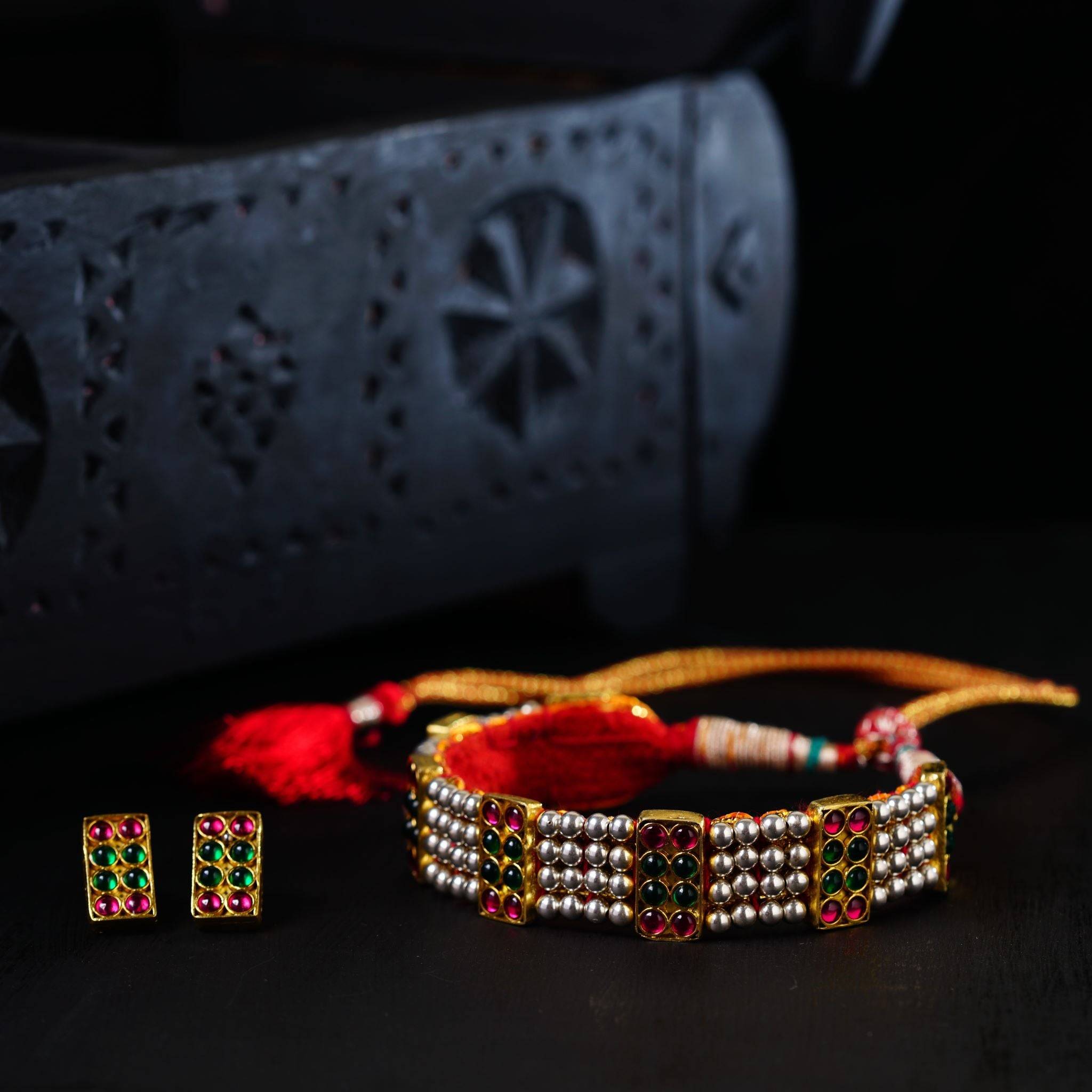 a couple of bracelets sitting on top of a table