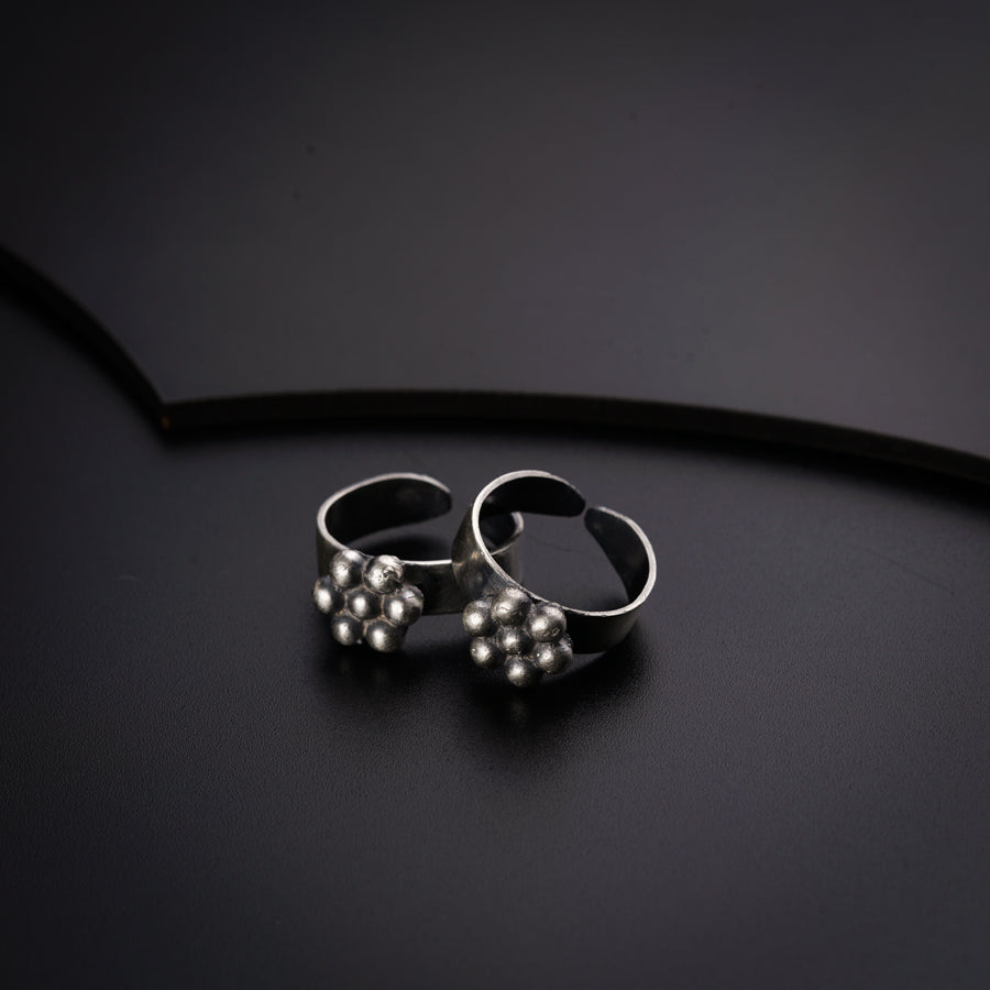 a pair of rings sitting on top of a table
