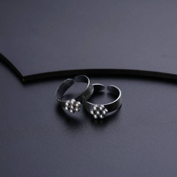 a pair of rings sitting on top of a table