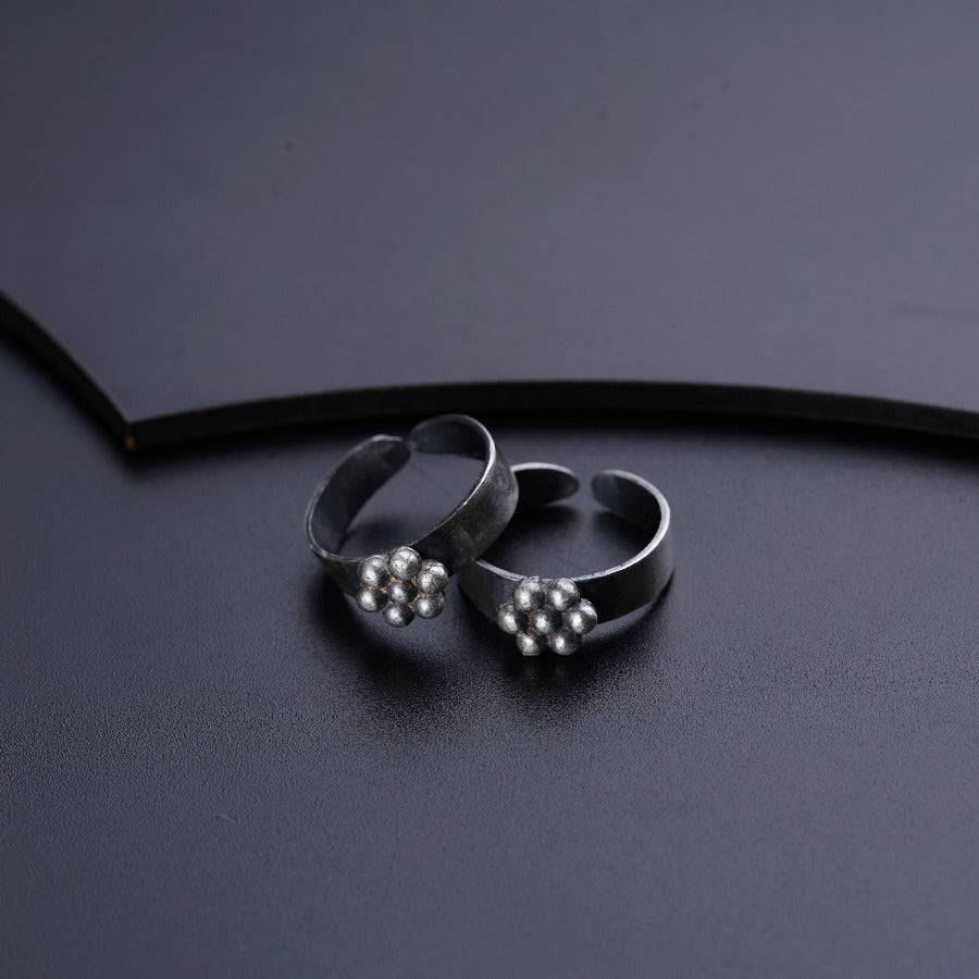 a pair of rings sitting on top of a table