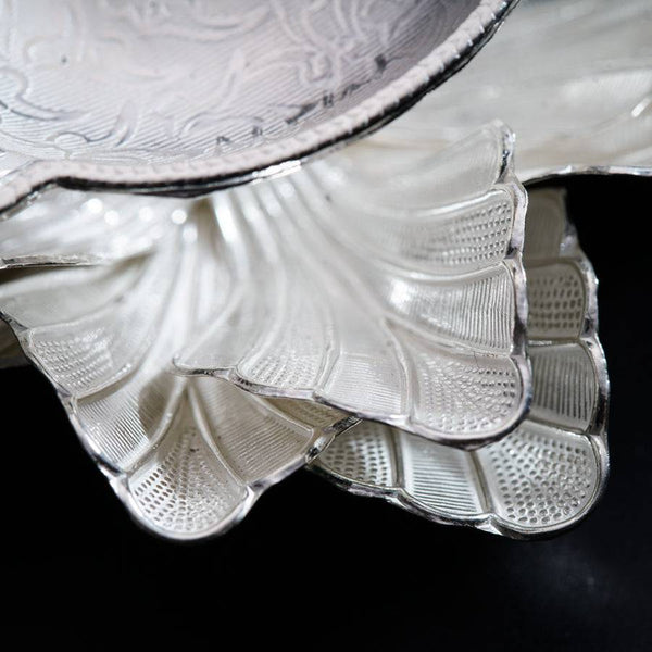 a close up of a glass plate on a table