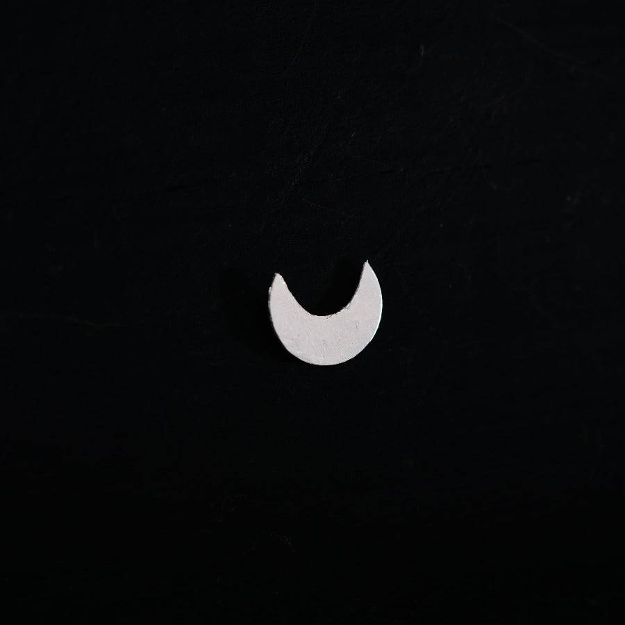 a white crescent on a black background
