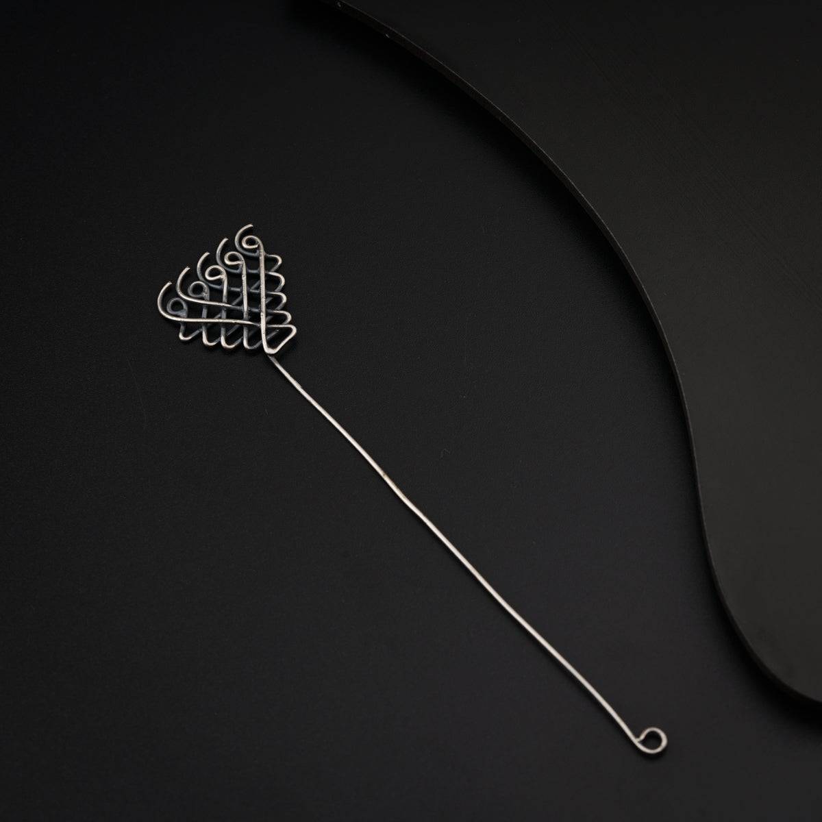 a hair brush with a wire attached to it
