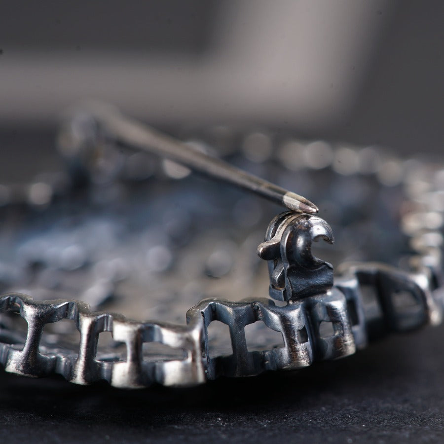 a close up of a metal object on a table