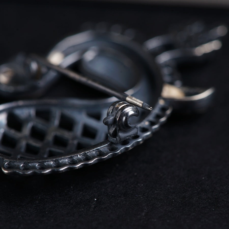a pair of scissors sitting on top of a table