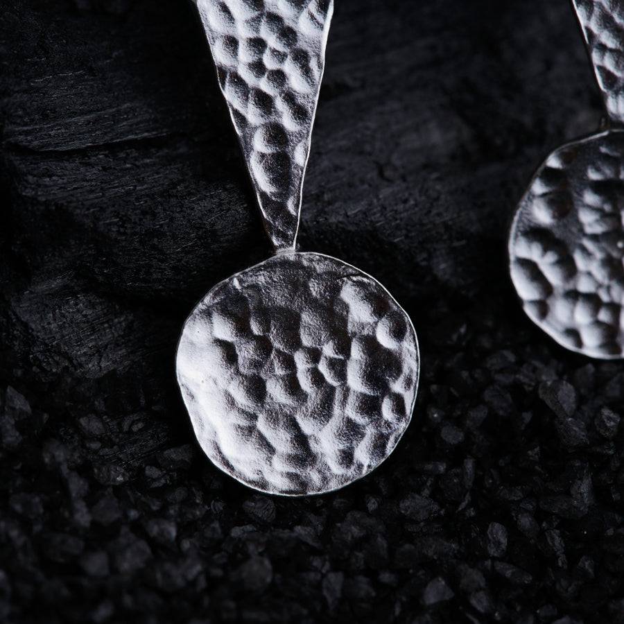 a close up of a pair of earrings