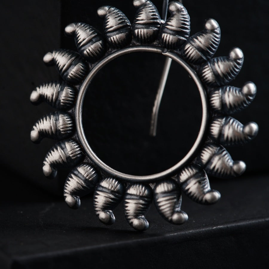 a metal object with a circular design on it