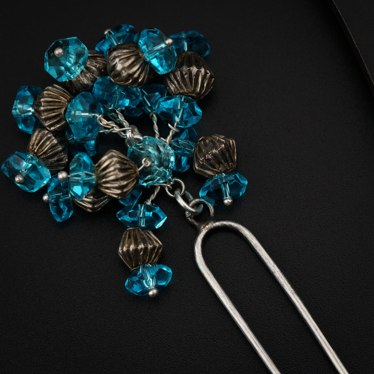 a close up of a bunch of beads on a table