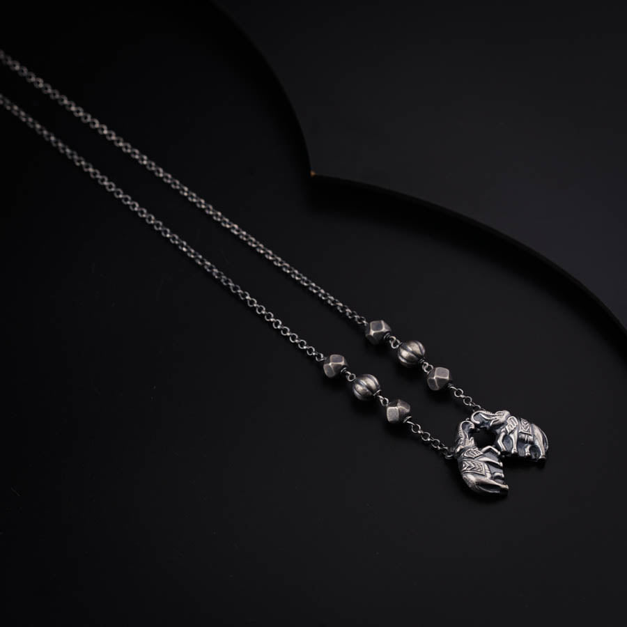 a necklace with a skull on it