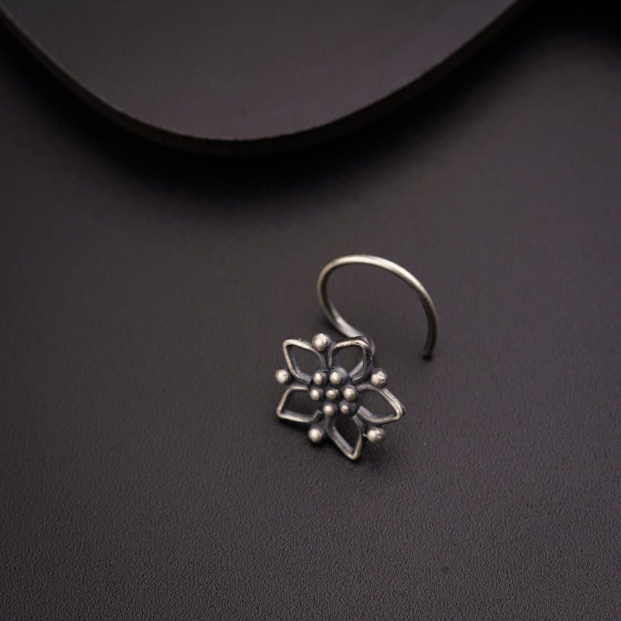 a close up of a ring on a table