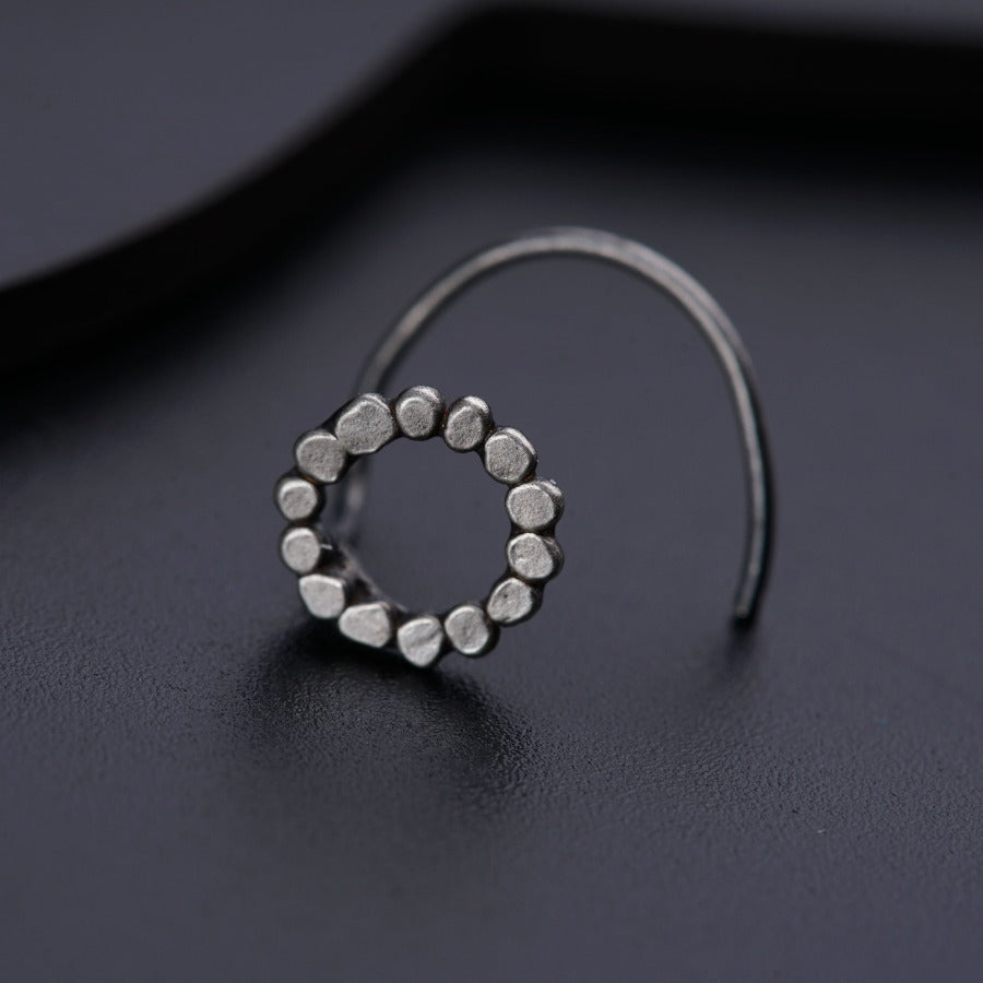 a close up of a ring on a table