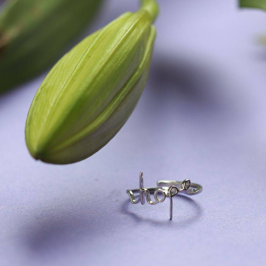 a close up of a ring on a flower