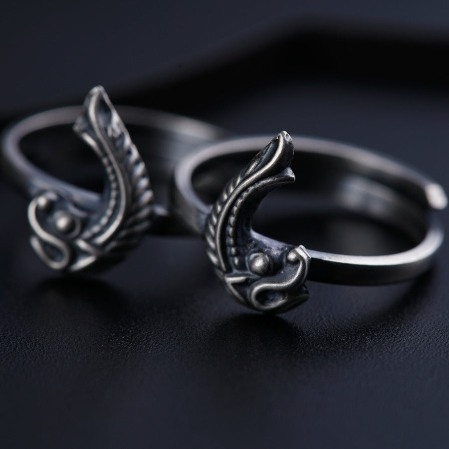 a pair of rings sitting on top of a table