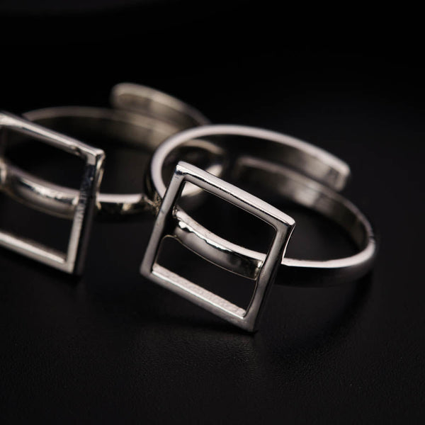 a couple of rings sitting on top of a table