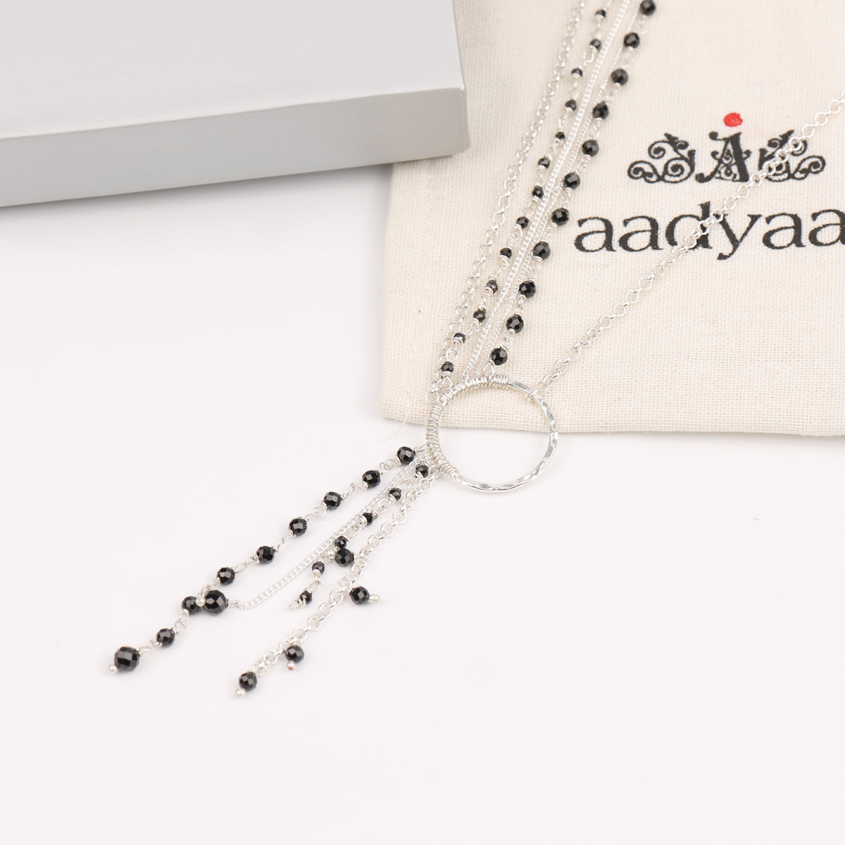 Multilayered Asymmetrical Necklace with Black Spinel (Project Handmade)
