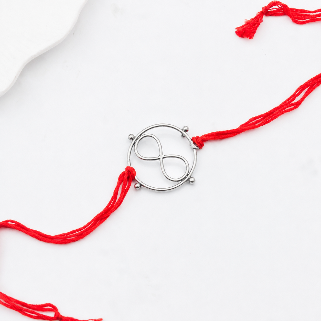 Silver Infinity Round Rakhi