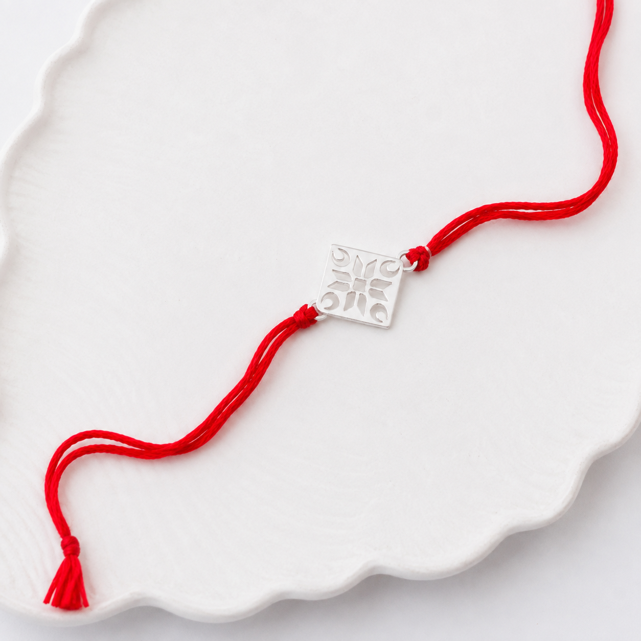 Silver Laser cut Rakhi