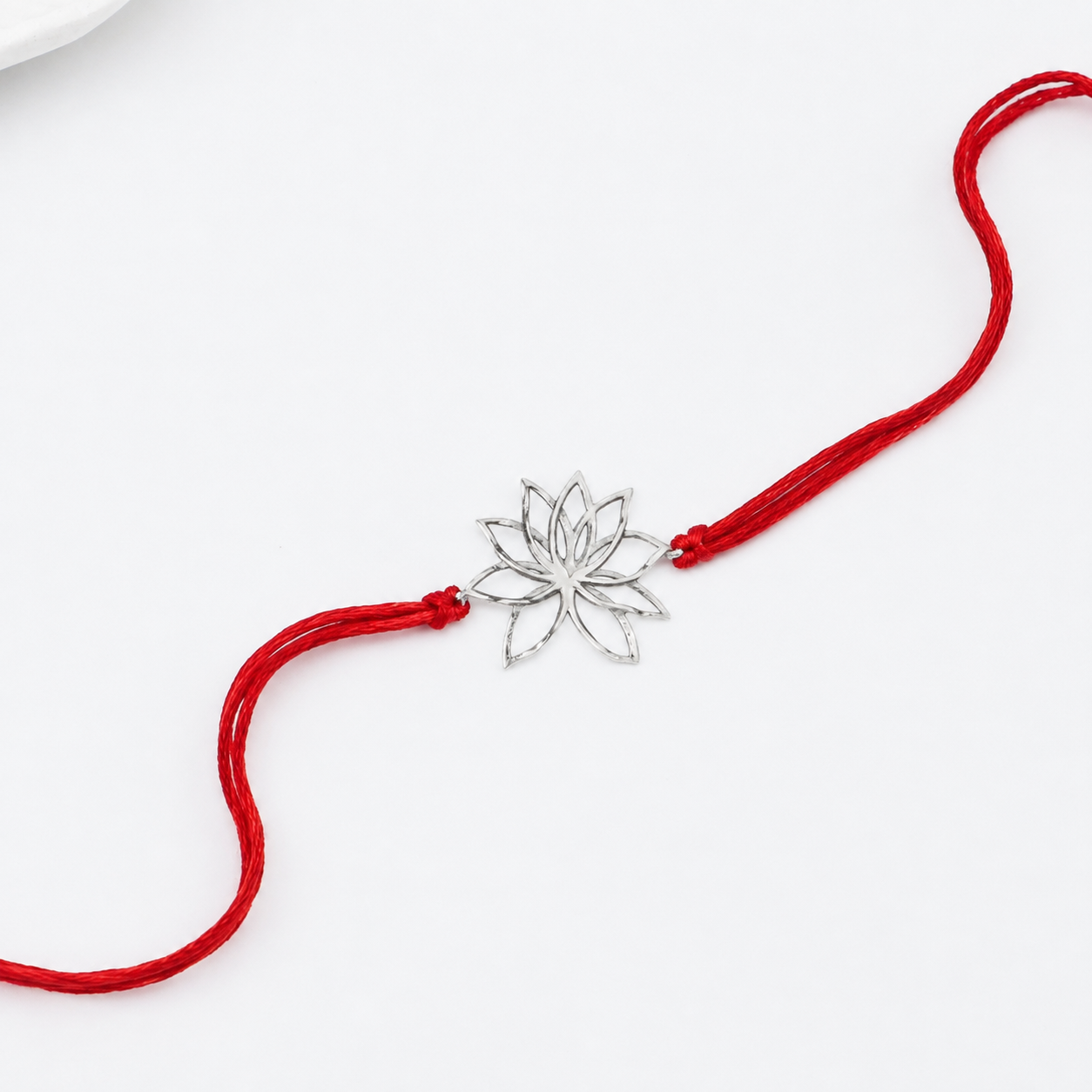 Handmade Silver Rakhi: Lotus