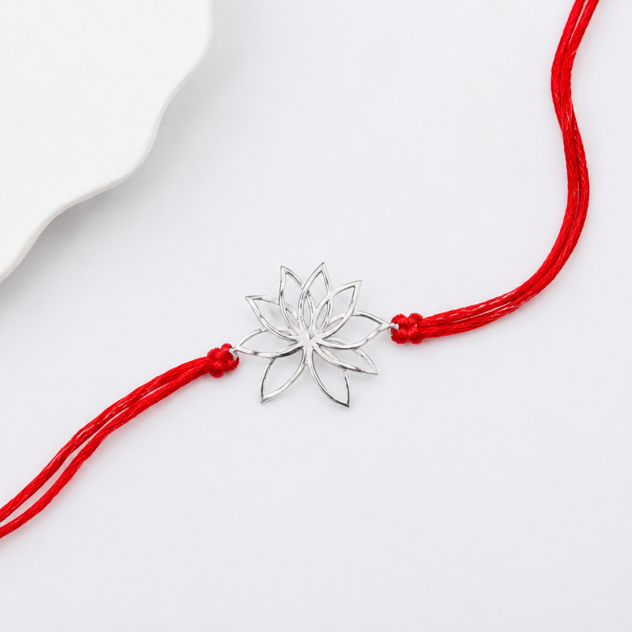 Handmade Silver Rakhi: Lotus