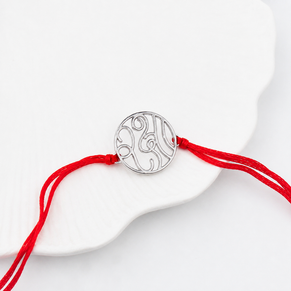 Handcrafted Silver Rakhi/Pendant: रक्षा (Raksha)
