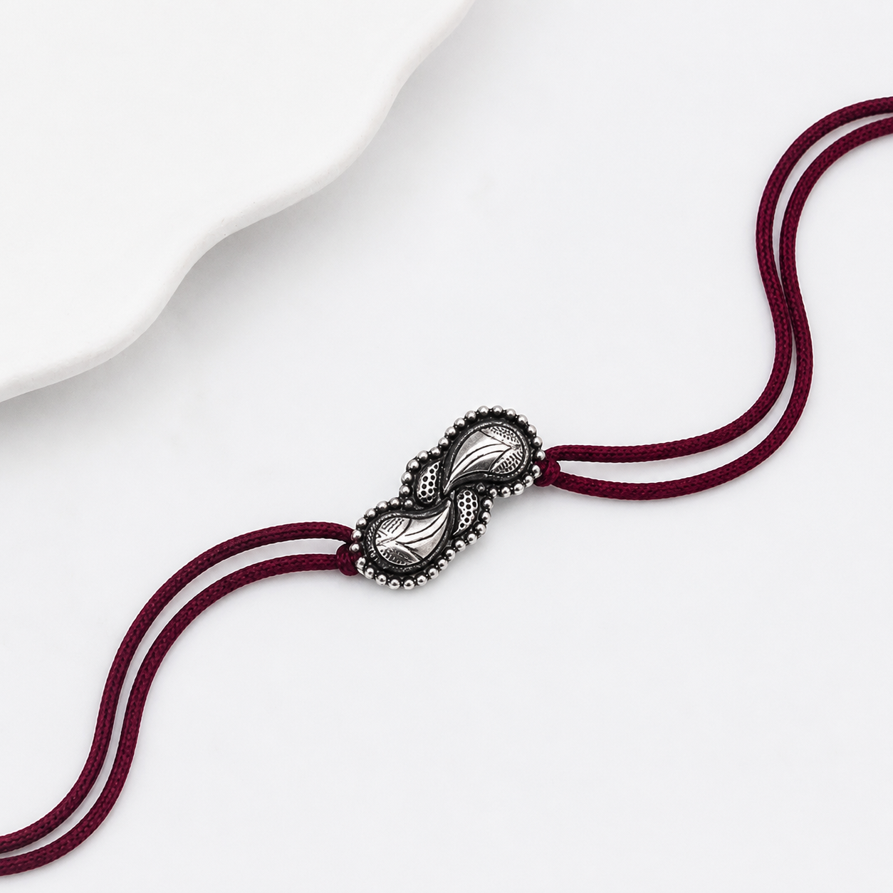 Handcrafted Silver Rakhi/Pendant: Filigree Koyari