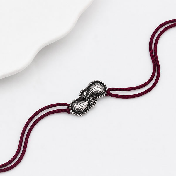 Handcrafted Silver Rakhi/Pendant: Filigree Koyari