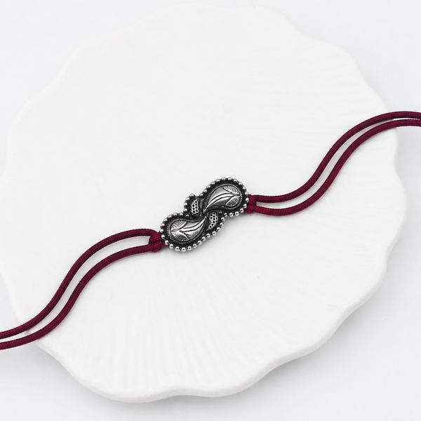 Handcrafted Silver Rakhi/Pendant: Filigree Koyari