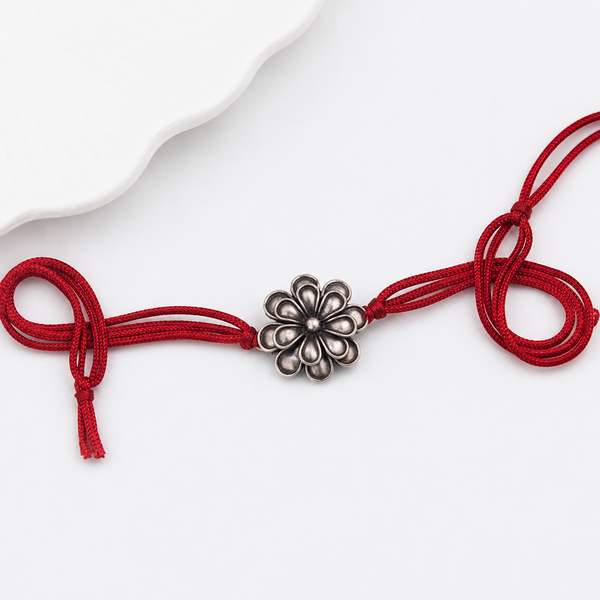 Handcrafted Silver Rakhi/Pendant: Double Flower
