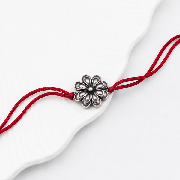 Handcrafted Silver Rakhi/Pendant: Double Flower