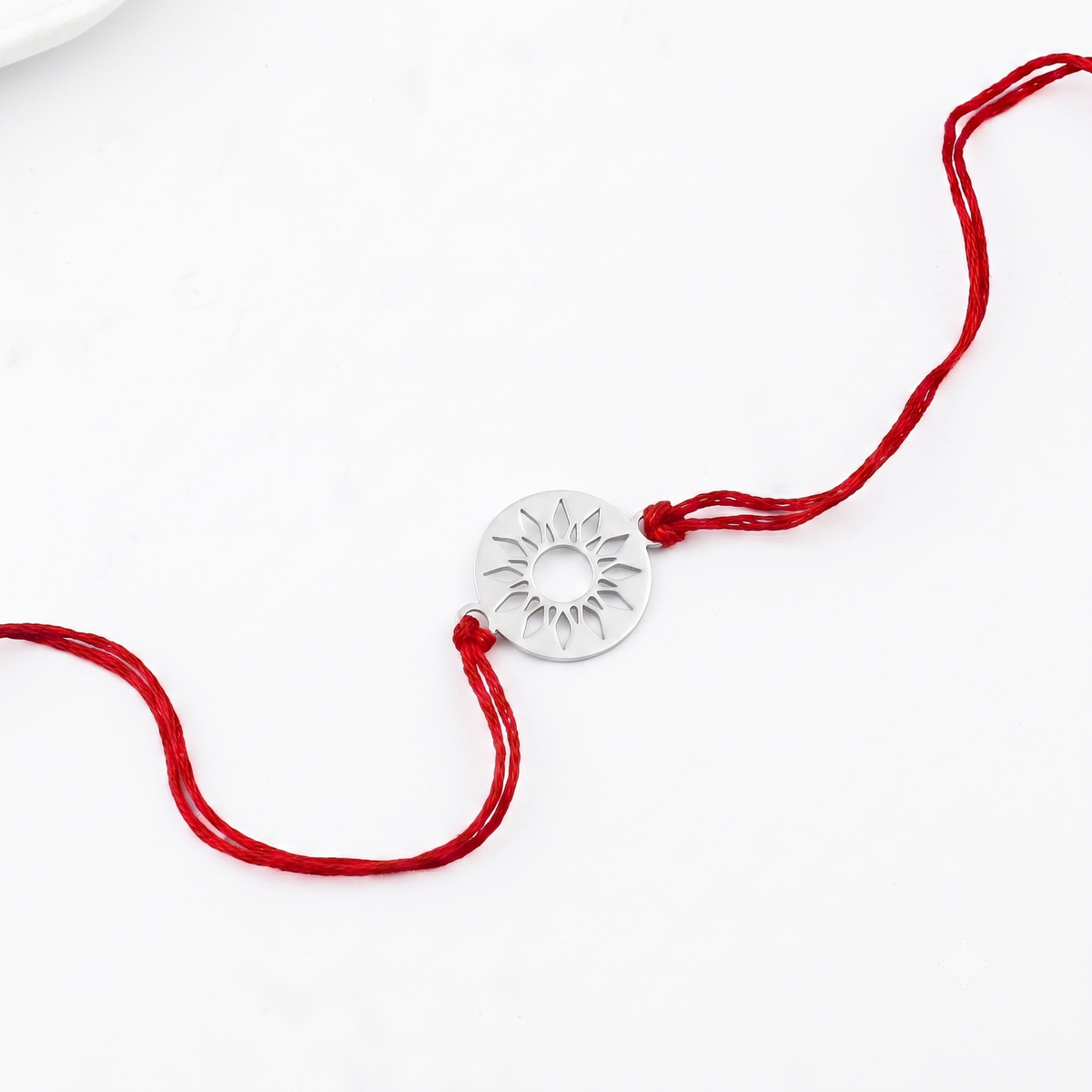 Silver Laser Cut Sun Rakhi