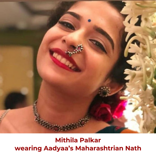 a woman with a nose ring and nose ring