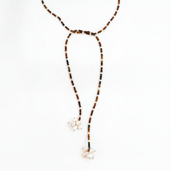 Silver tie and wear necklace with multicolour stones and pearls