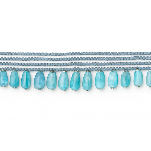 Close-up of silver purity certificate for Luxe Labradorite Larimar necklace
