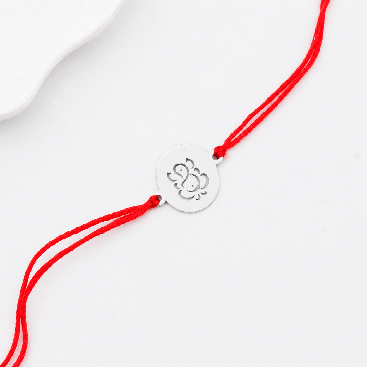Handcrafted Silver Rakhi: Ganesh