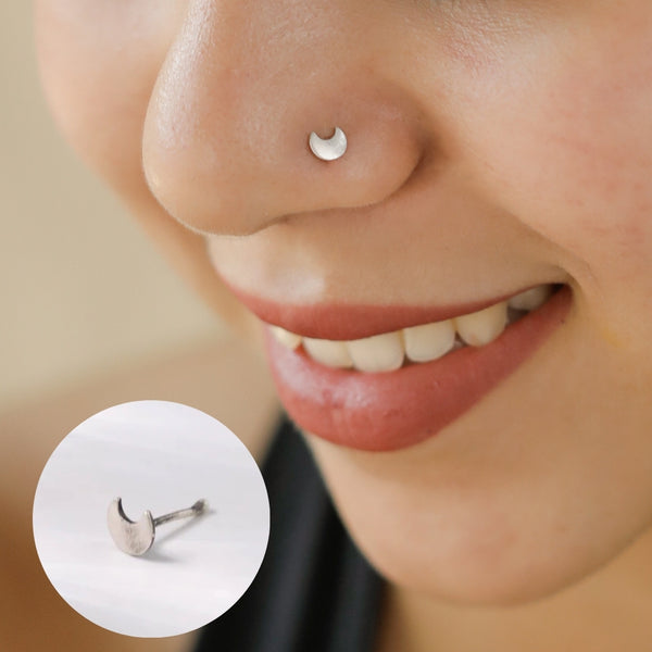 Close-up of Silver Tiny Chandrakor Nose Pin with crescent detail