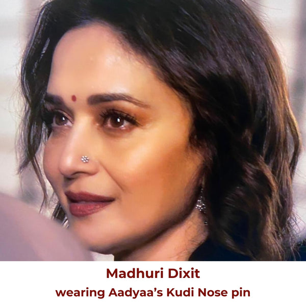 Flat-lay Itihaas kudi nose pin small on neutral background