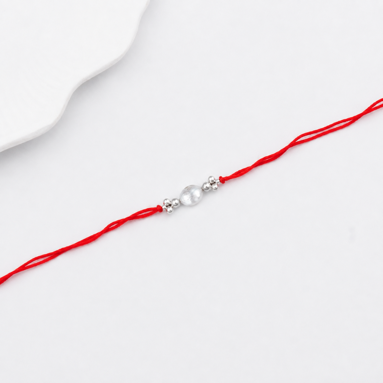 Baroque Pearl & Silver Bead Rakhi (Project Handmade)