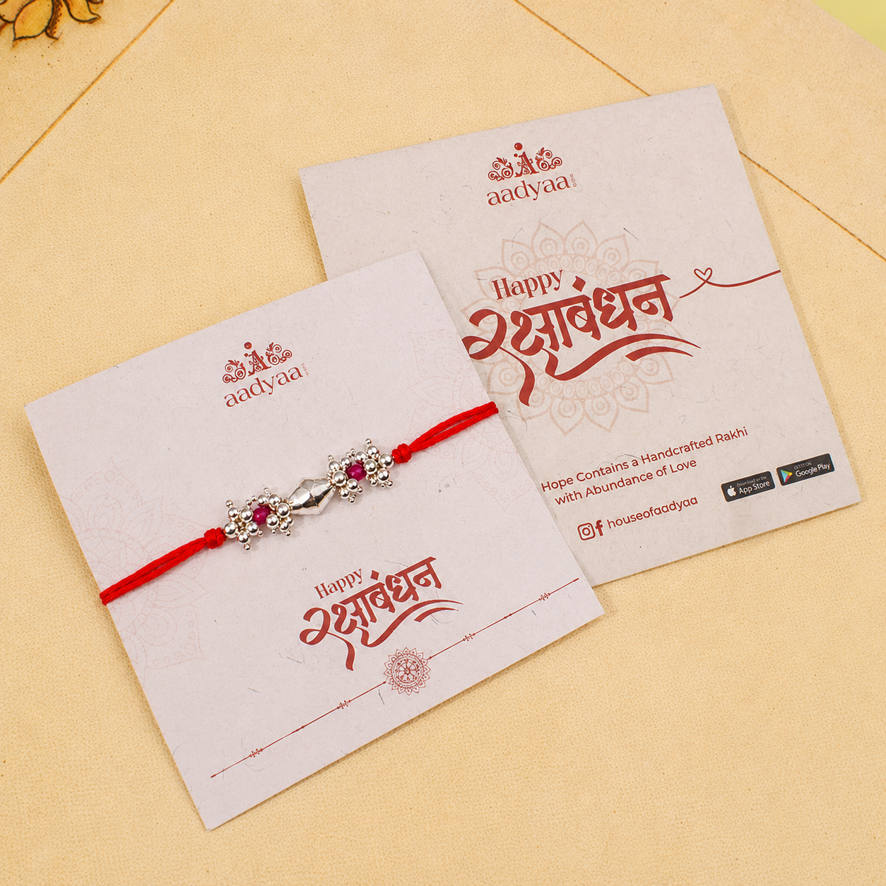 Silver Dholki Bead, Ruby & Pearl Bunch Rakhi (Project Handmade)