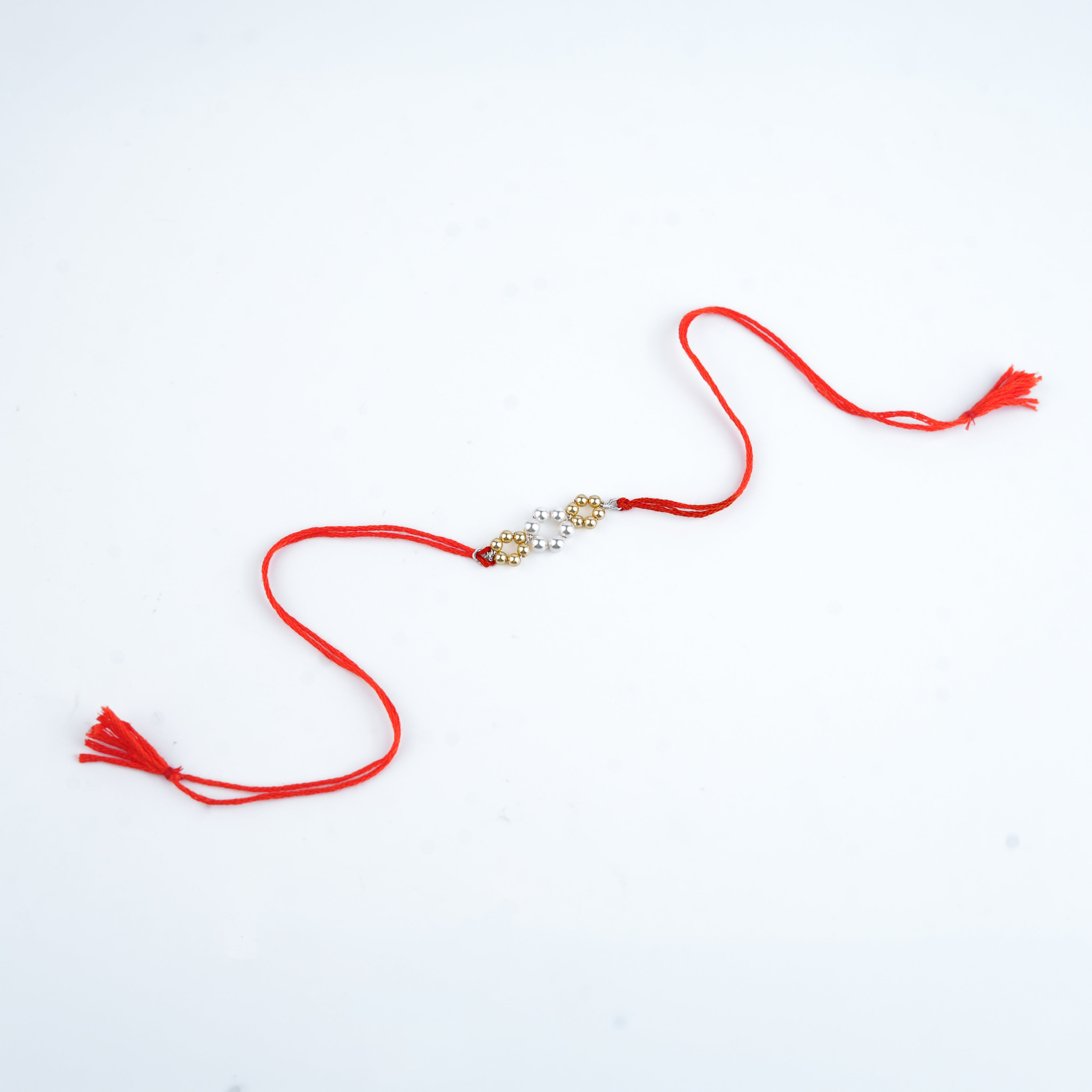 Golden & White Pearl Handmade Silver Rakhi