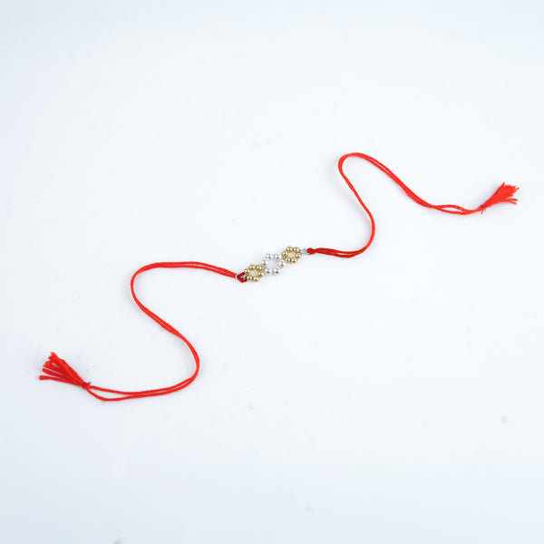 Golden & White Pearl Handmade Silver Rakhi